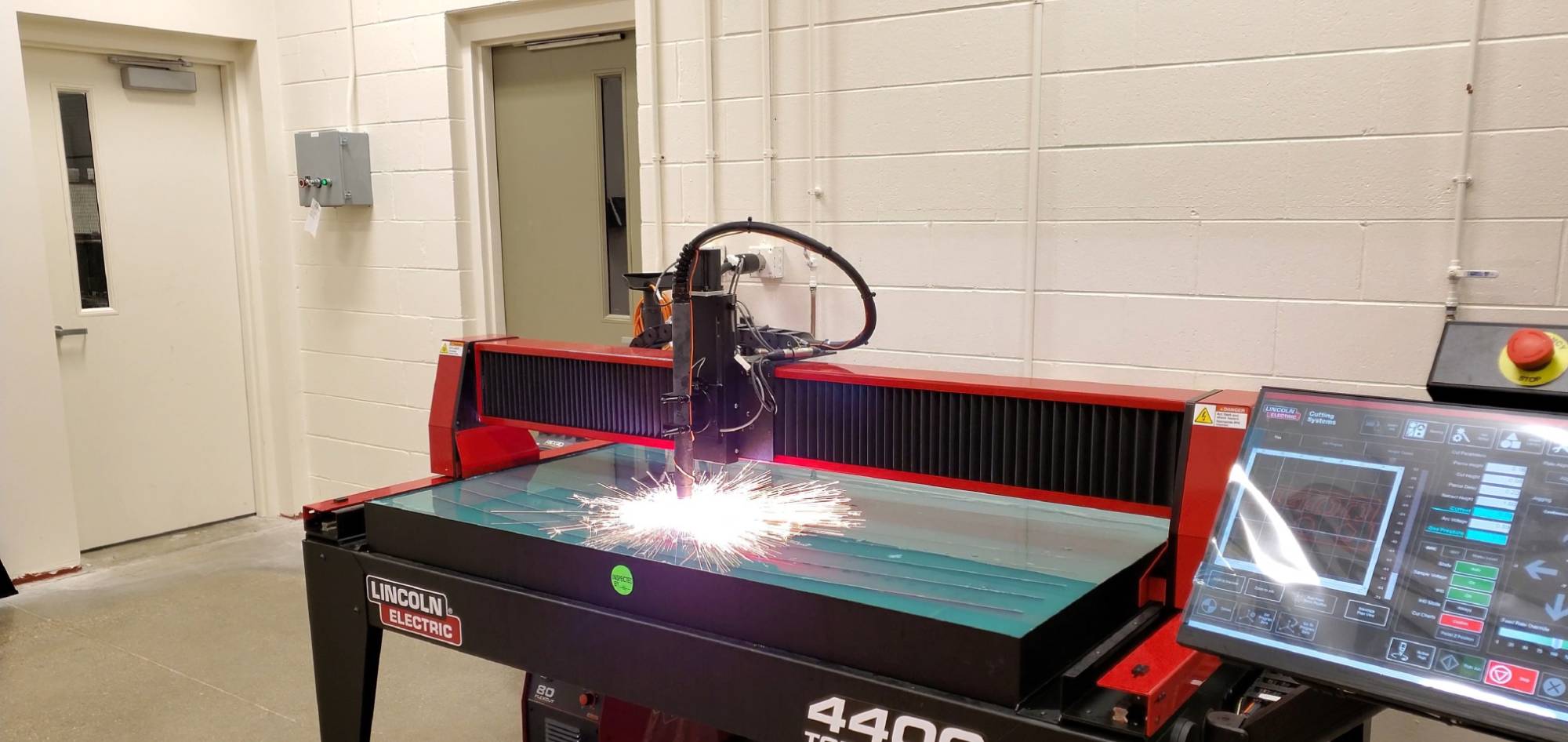 plasma table cutting steel in the fabrication lab